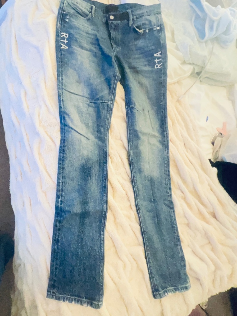 RTA womens jeans, never worn, featuring large white “RTA” branding on the thighs